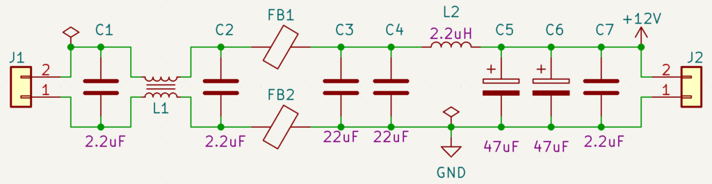 The schematic of the filter board used to see how the conducted emissions were filtered. There is a common mode choke, ferrite, and a PI filter.